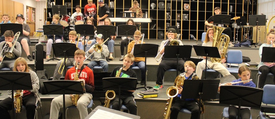 Students playing musical instruments