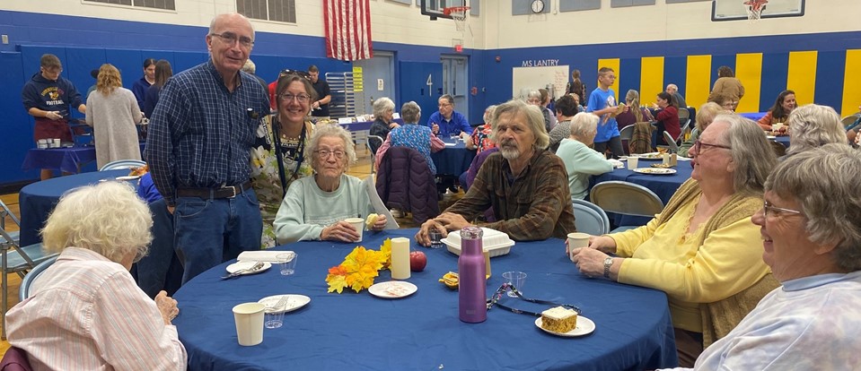 senior citizens and Mrs. Rusnak at our luncheon