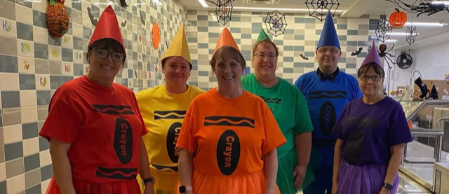 cafe staff in crayon costumes