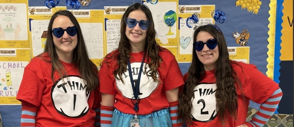 three WAO staff dressed as THING 1 and THING 2