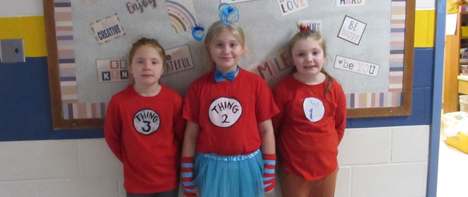 three little WAO children dressed as Thing 1 and Thing 2