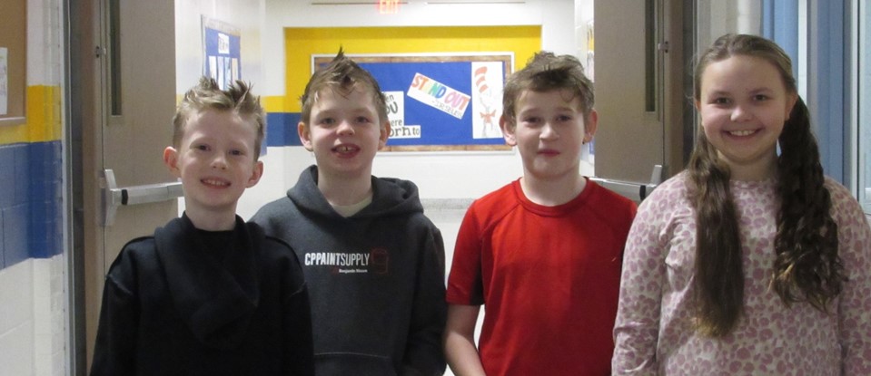 four students with silly hairstyles 